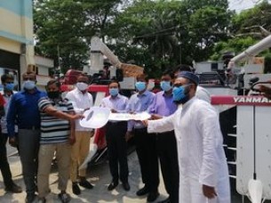ভোলায় কৃষকের মাঝে কম্বাইন্ড হারভেস্টার মেশিন বিতরণ